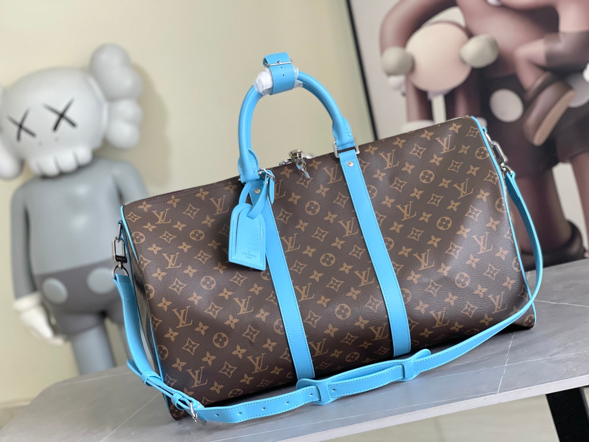 Keepall Bandoulière 50 – Monogram Canvas with Sky Blue Leather Trim