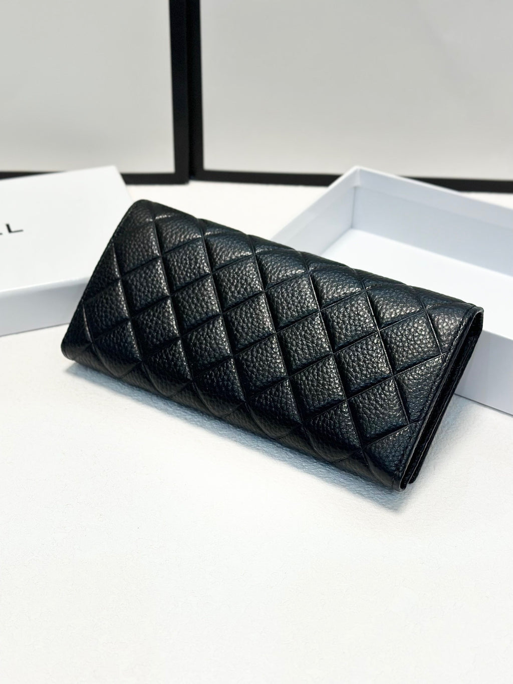 Quilted Black Leather Wallet with Silver Logo