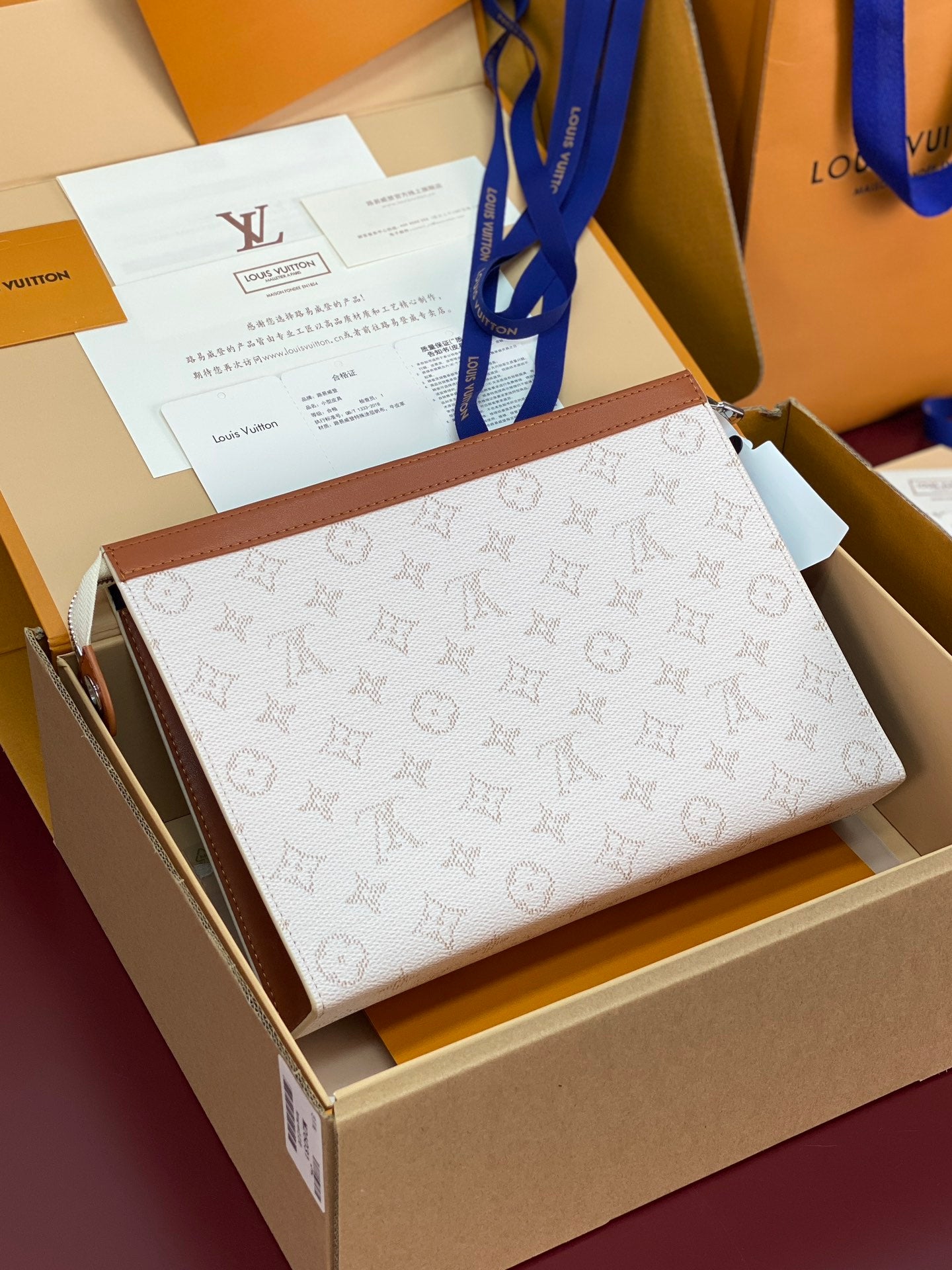 Pochette Voyage – Monogram Heritage Canvas