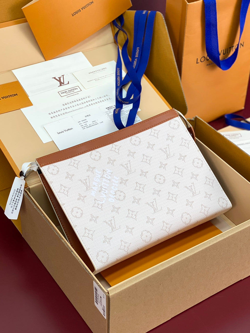 Pochette Voyage – Monogram Heritage Canvas