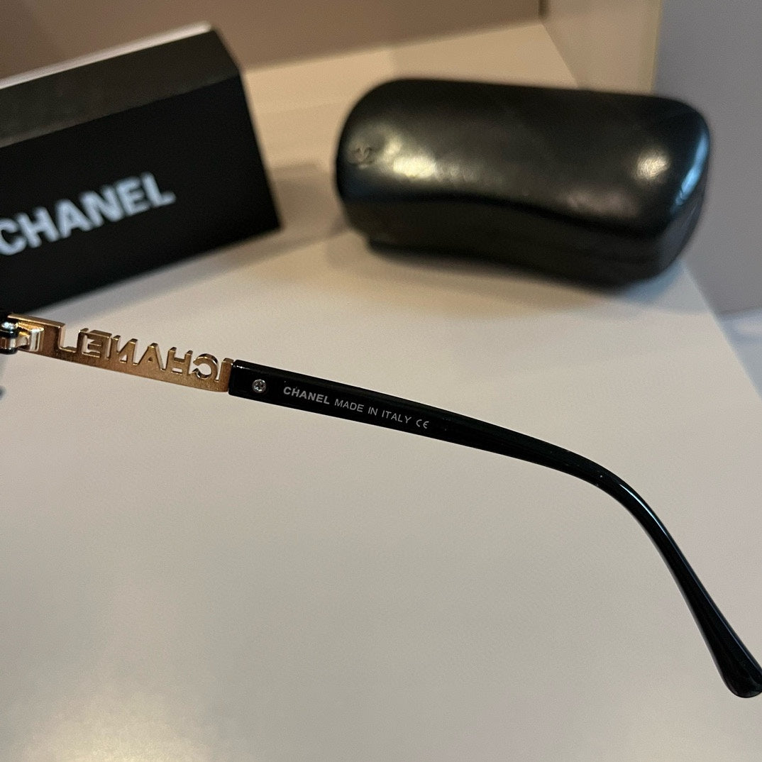 Black Frame Eyewear with Gold Chain Detail