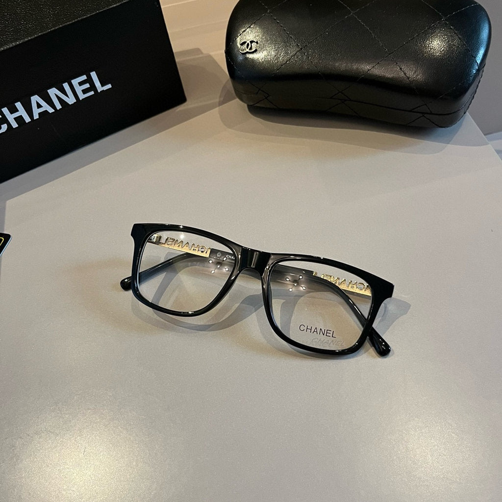 Black Frame Eyewear with Gold Chain Detail