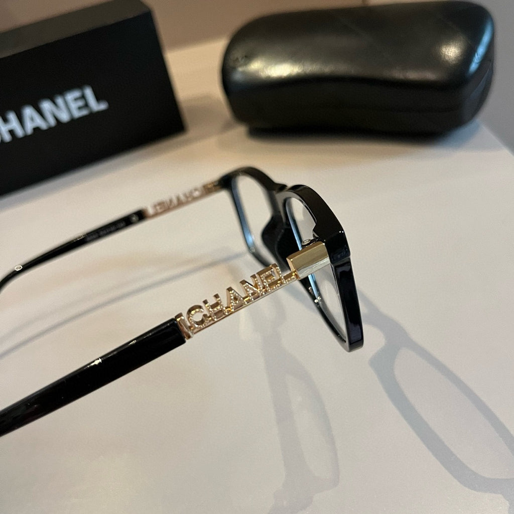 Black Frame Eyewear with Gold Chain Detail