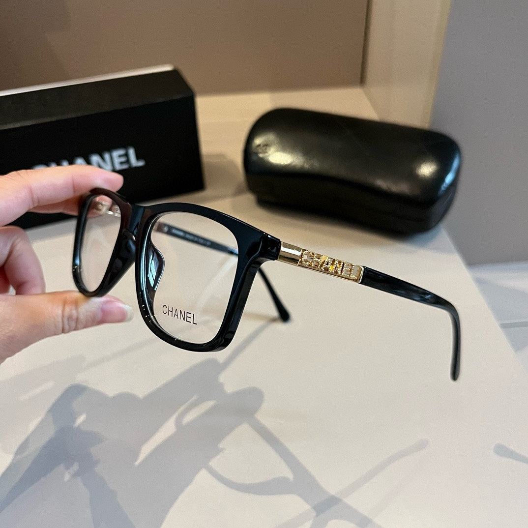 Black Frame Eyewear with Gold Chain Detail