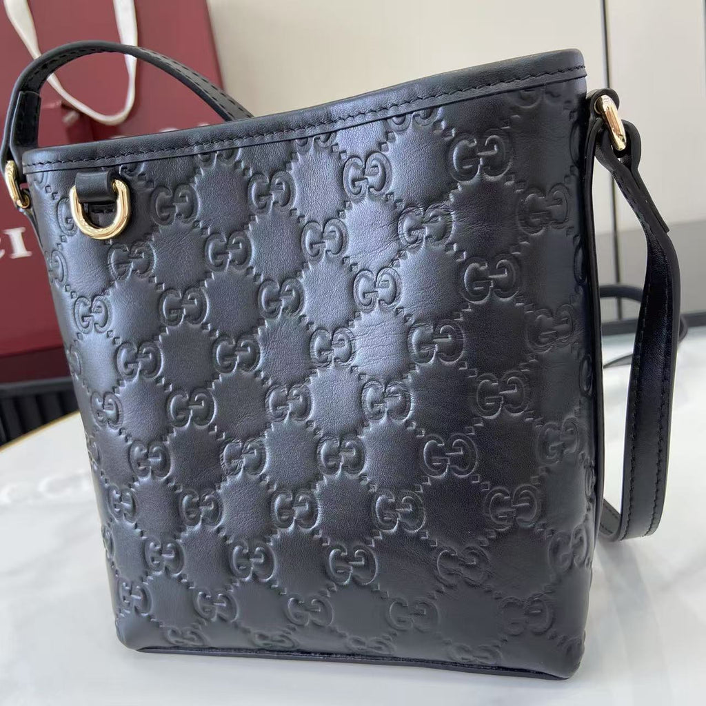 GG Emblem Mini Black Leather Crossbody Bag
