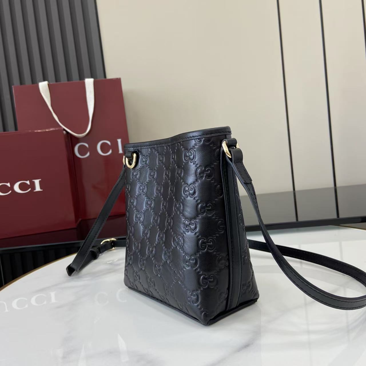 GG Emblem Mini Black Leather Crossbody Bag
