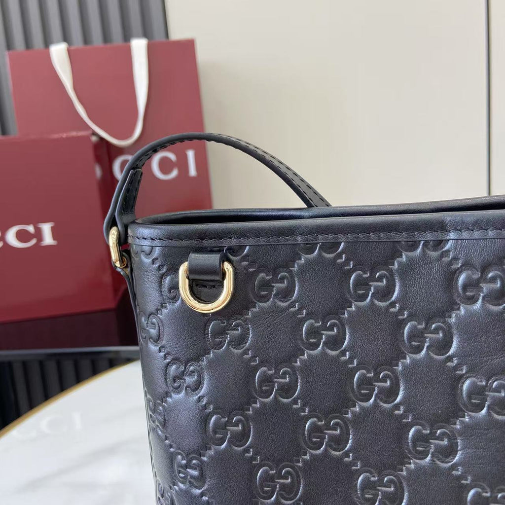 GG Emblem Mini Black Leather Crossbody Bag