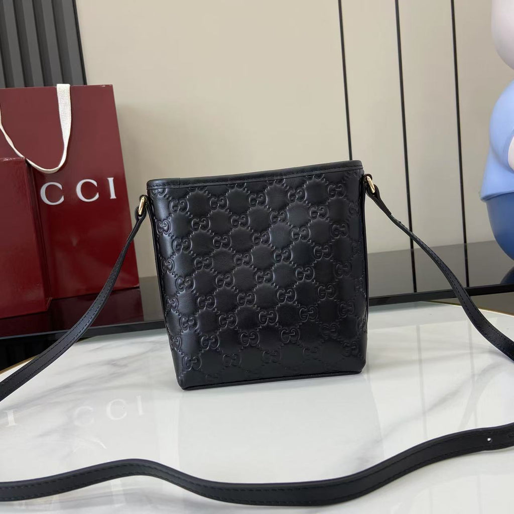 GG Emblem Mini Black Leather Crossbody Bag