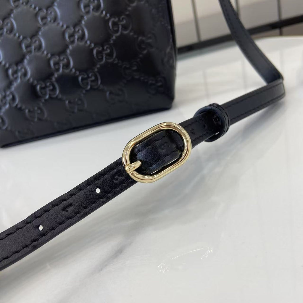 GG Emblem Mini Black Leather Crossbody Bag