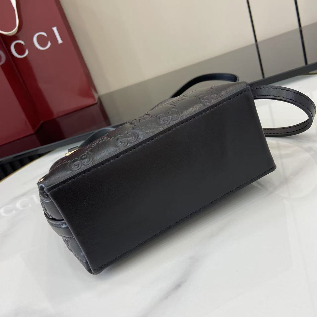 GG Emblem Mini Black Leather Crossbody Bag