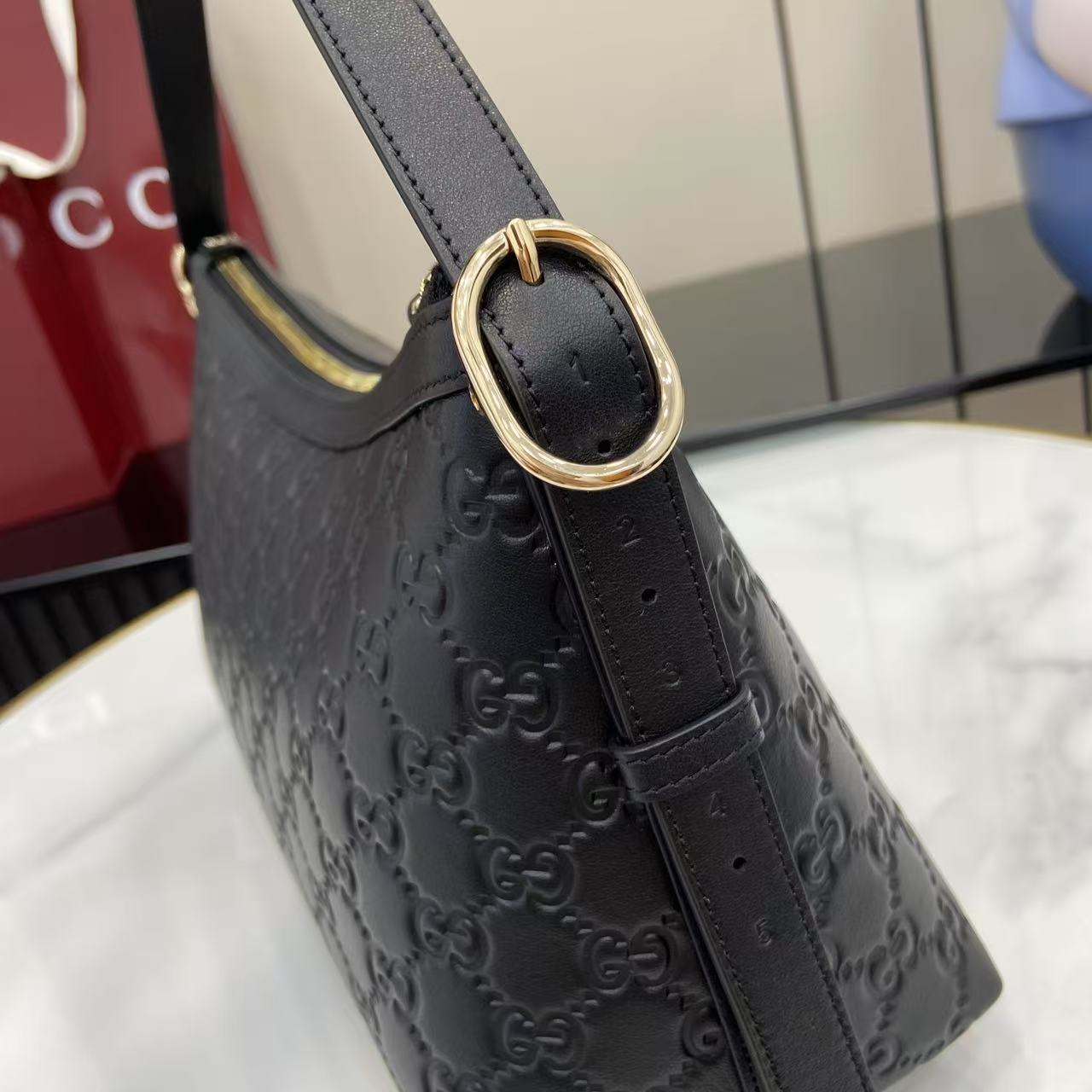 GG Emblem Leather Shoulder Bag