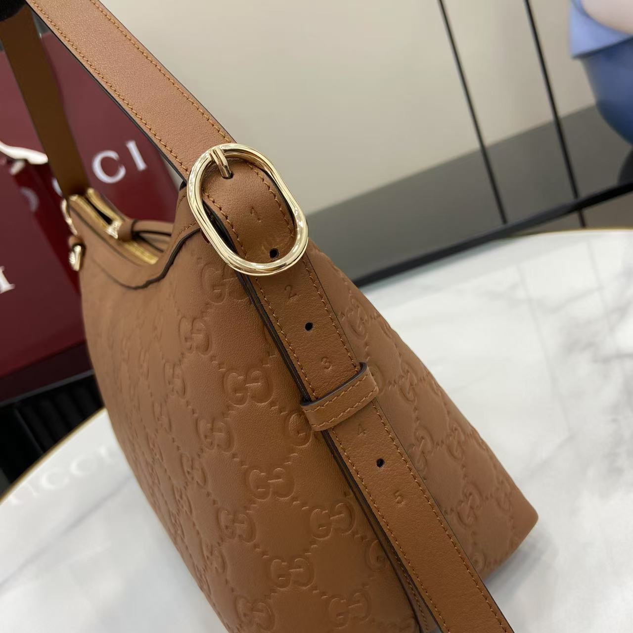 GG Emblem Leather Shoulder Bag